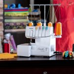1034D Serger, Heavy-Duty Metal Frame Overlock Machine, 1,300 Stitches Per Minute, Removeable Trim Trap, 3 Included Accessory Feet - Image 4